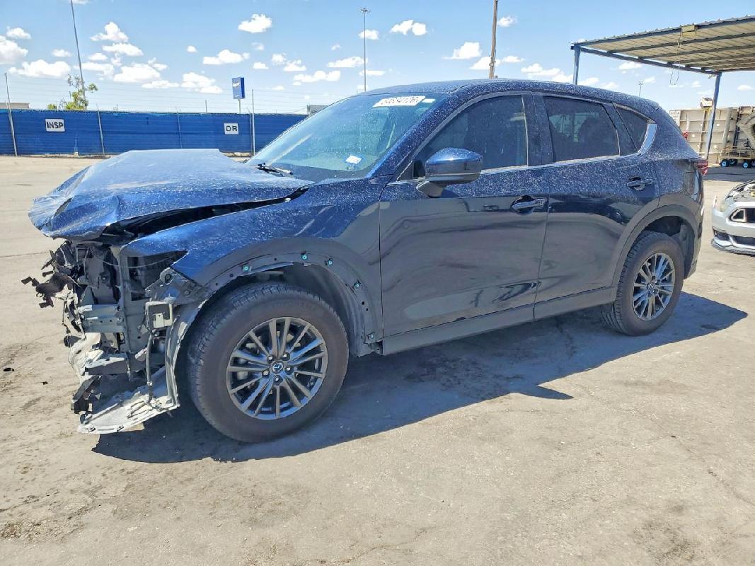 2019 Mazda CX-5 VIN JM3KFACMXK0669754 фото с аукциона