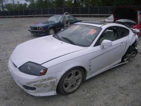 2006 HYUNDAI Tiburon 2.7L VIN KMHHN65F66U218834 фото с аукциона