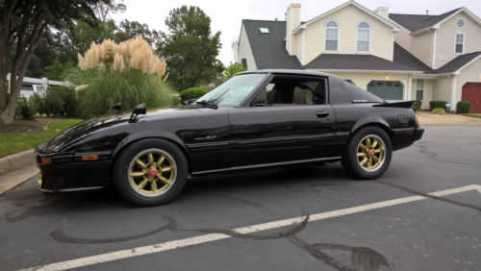 1985 Mazda RX-7 VIN JM1FB3329F0866713 фото с аукциона