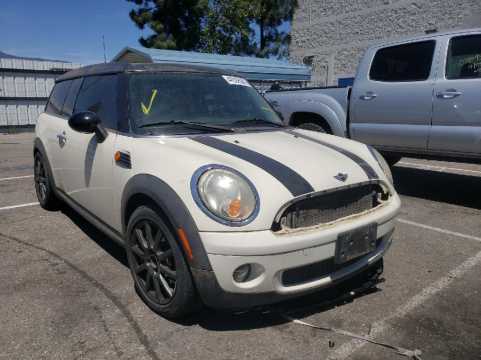 2010 MINI Cooper VIN WMWML3C54ATX38981 auction photo