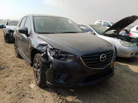 2016 MAZDA CX-5 GRAND TOURING VIN JM3KE4DYXG0883608 фото с аукциона