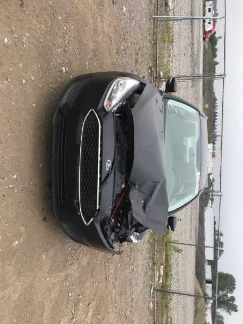 2015 Ford Focus SE VIN 1FADP3F24FL230385 фото с аукциона