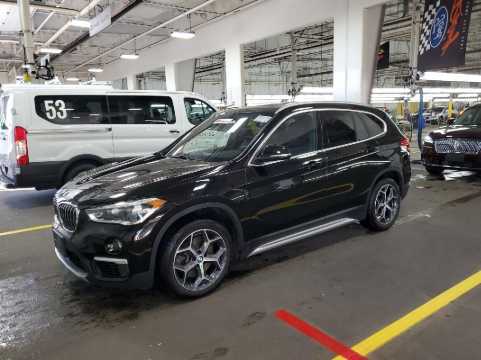2018 BMW X1 VIN WBXHT3C37J3H32004 фото с аукциона
