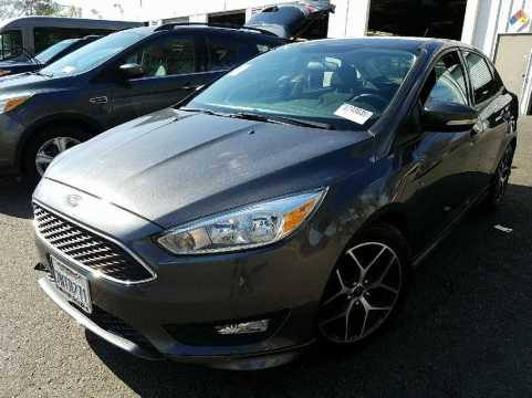 2015 Ford FOCUS 4C SE VIN 1FADP3F24FL306459 фото с аукциона