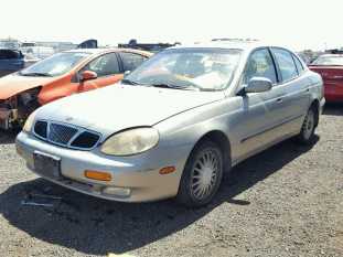 1999 DAEWOO LEGANZA CD VIN KLAVA6922XB202774 auction photo 1