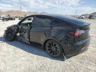 2023 Tesla Model Y VIN 7SAYGAEE9PF780653 фото с аукциона 1