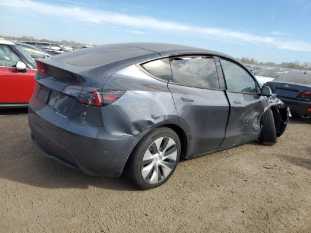 2022 TESLA Model Y VIN 7SAYGAEE9NF328425 auction photo 2