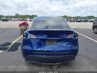 2023 TESLA Model Y VIN 7SAYGDEE8PA200114 фото с аукциона 5