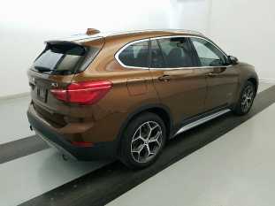 2017 BMW X1 VIN WBXHT3C38H5F72357 фото с аукциона 3