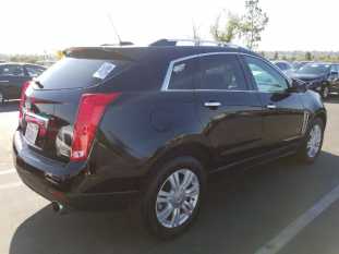 2016 CADILLAC Srx LUXURY COLLECTION (FWD) VIN 3GYFNBE3XGS574399 фото с аукциона 1
