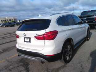 2018 BMW X1 VIN WBXHT3C3XJ5K30606 фото с аукциона 1