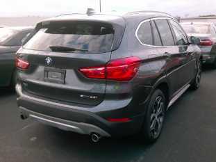 2018 BMW X1 VIN WBXHU7C30J3F04463 фото с аукциона 1